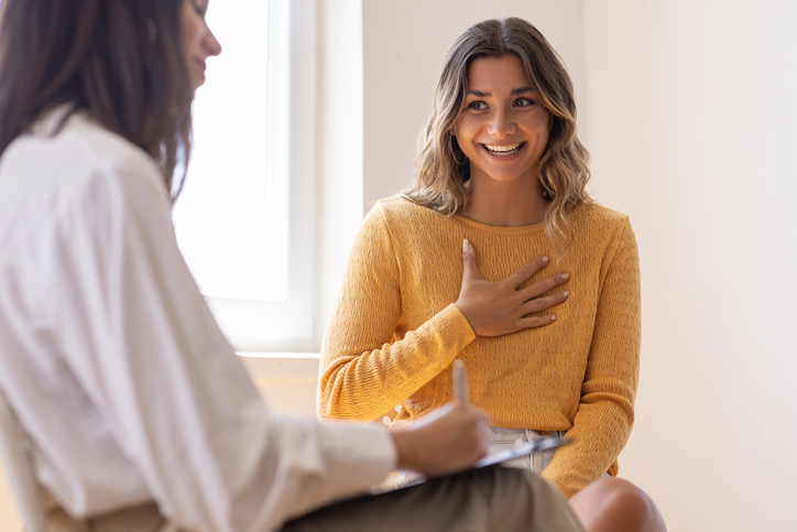 A therapist talking with patient