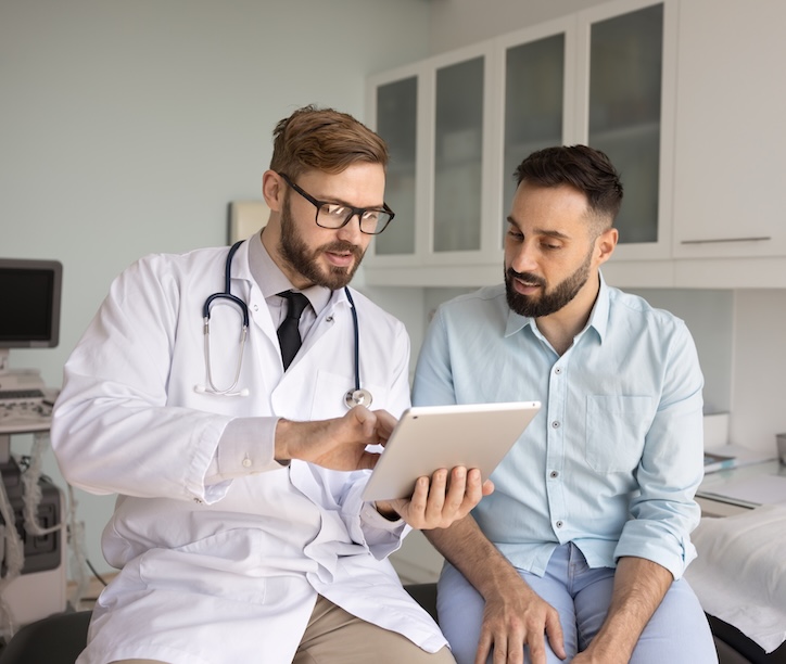 Doctor speaking with a male patient