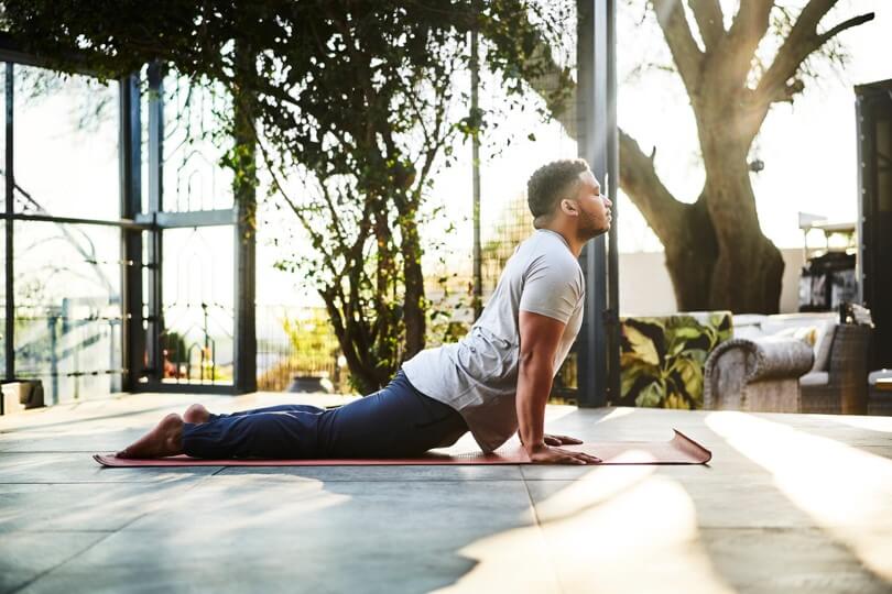 Photo of man doing yoga