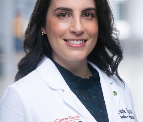 Dr. Bojanini wearing her white coat